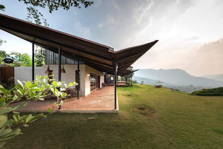 The House with the Gabion / Spasm Design - Image 1 of 26