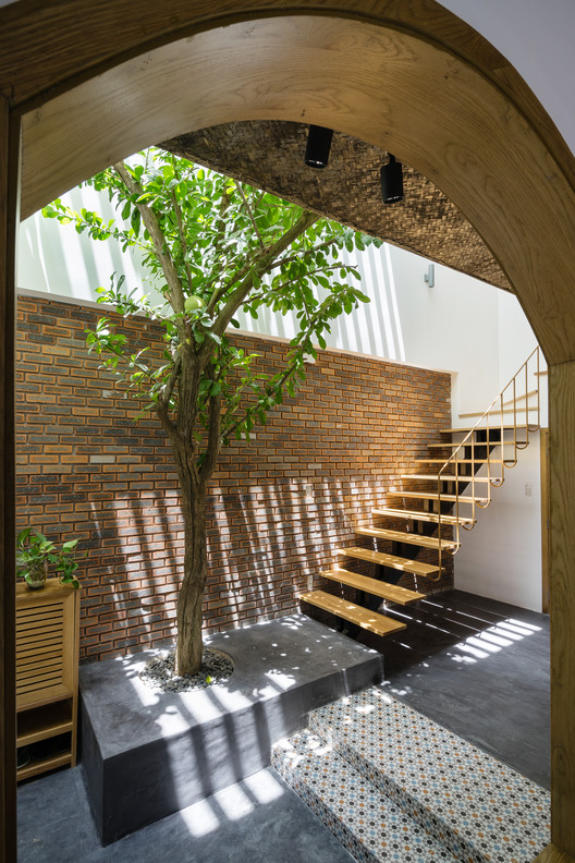 7x7 House / IZ Architects - Arch, Arcade