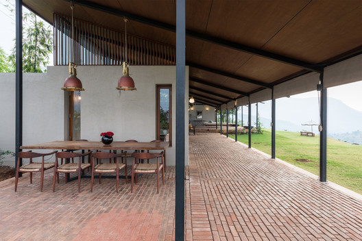 The House with the Gabion  / Spasm Design - Table, Chair, Beam, Windows