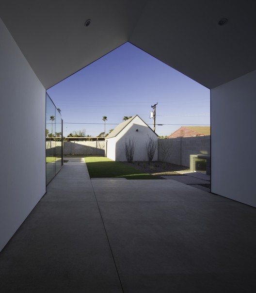 Escobar Renovation / Chen + Suchart Studio - Facade, Concrete