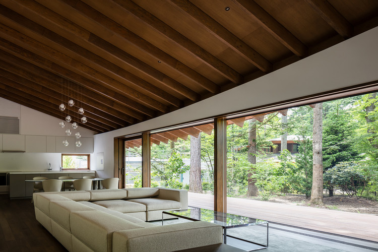 Four Leaves Villa / KIAS - Interior Photography, Living Room, Table, Windows, Beam